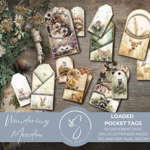 以下が含まれることがあります： ハリネズミ、鹿、ウサギなどの森の動物のイラストが描かれた、装飾用のポケットタグのコレクション。タグは様々な形とサイズで、素朴でヴィンテージな雰囲気です。「Wandering Meadow」と「Loaded Pocket Tags」の文字が見えます。