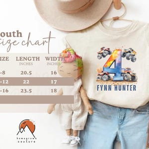 May include: A white t-shirt with a colorful number four and monster trucks printed on it. The text "FYNN HUNTER" is printed below the number. A size chart is included with the text "Youth size chart" and measurements in inches.