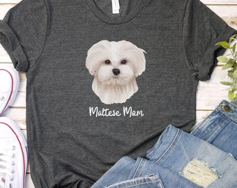 May include: A dark gray t-shirt with a white Maltese dog illustration and the text "Maltese Mom" printed on the front.