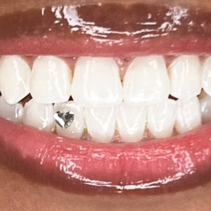 2 pc heart tooth gem %100 Swarovski crystal