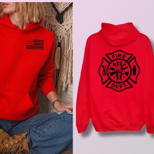 May include: Red hooded sweatshirt with a black American flag on the front and a black firefighter emblem on the back that says "FIRE DEPT."