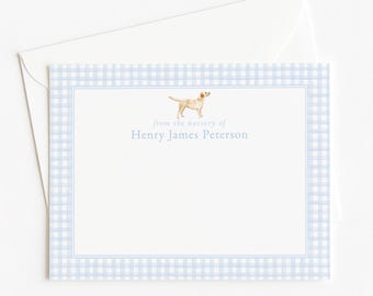 May include: A rectangular stationery card with a light blue and white gingham border. The center features a small watercolor illustration of a golden dog above the text "from the nursery of Henry James Peterson" in light blue ink, with an envelope.