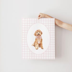 May include: A watercolor illustration of a brown dog wearing a pink bow, set against a pink and white gingham background.