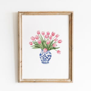 May include: A watercolor painting of a bouquet of pink tulips in a blue and white porcelain vase. The vase has a floral pattern and is sitting on a white background.