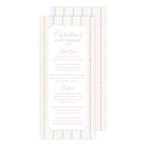May include: A vertical rectangular menu card for Caroline's Baby Shower featuring a light pink and white pinstripe background with green floral accents. The text includes sections for Appetizer and Entree with various food items listed in pink.