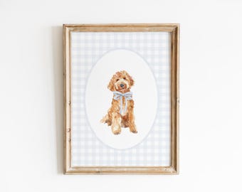 May include: A framed print of a watercolor painting of a brown dog wearing a blue bow tie. The background is a light blue and white gingham pattern.