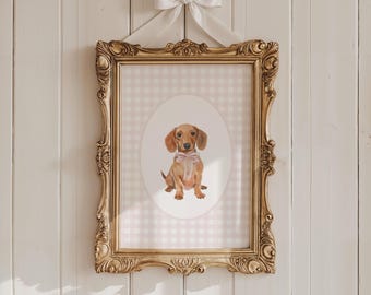 May include: A framed print of a dachshund wearing a pink bow tie. The print has a pink and white gingham background.