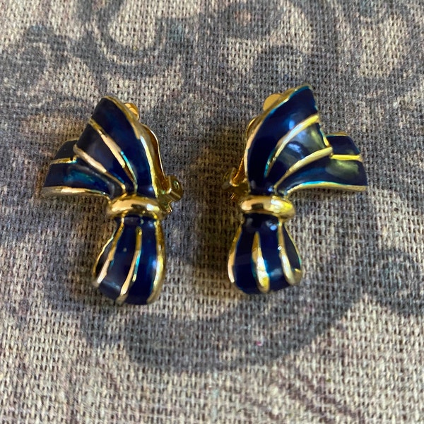 Vintage goldtone and blue enamel clip on earrings.