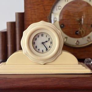 Vintage wind up celluloid, art deco, shelf or mantle clock.