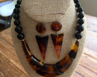 Vintage lucite beaded necklace and earrings.