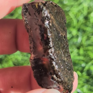 Raw Sumatran Amber Piece, Shines Blue tint in the sunlight.  Rare form of Indonesian Amber. Blue15