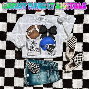 May include: A white long-sleeved shirt with a football, a black bow, and a blue helmet graphic. The shirt is paired with denim shorts, checkered scrunchie, and checkered slip-on shoes. The text "Add your own photos" is also on the shirt.