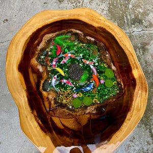 Koi fish coffee table handmade from epoxy resin, Handmade koi fish table inside round wooden panel, Wooden koi fish garden cafe table