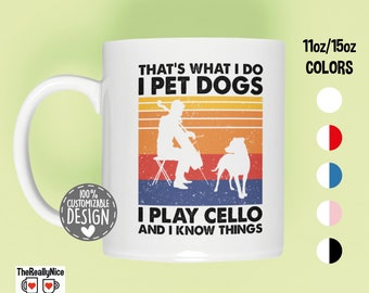 May include: White ceramic mug with a retro-style design featuring a silhouette of a person playing a cello and a dog. The text reads "That's what I do I pet dogs I play cello and I know things".