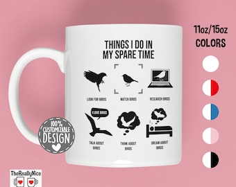 May include: White ceramic mug with a black design that says "Things I do in my spare time" and lists activities related to birds. The mug is 11oz or 15oz and comes in various colors.