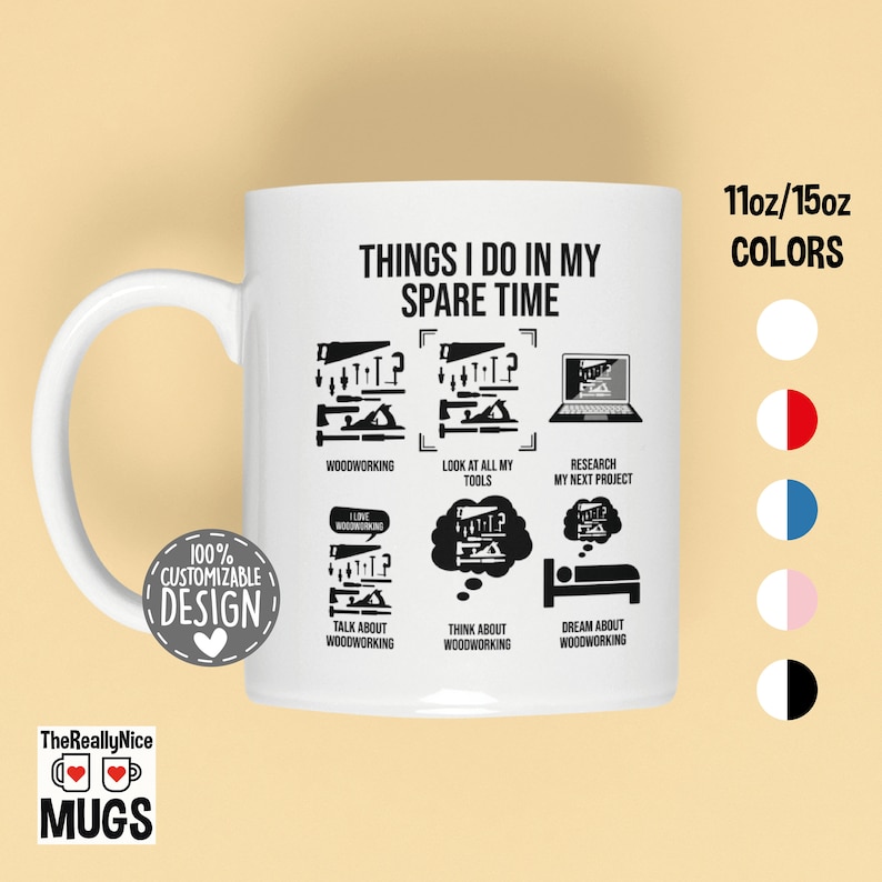 May include: White ceramic mug with a black design that says "Things I do in my spare time". The design includes illustrations of woodworking tools, a laptop, and thought bubbles with the words "Woodworking", "Talk about woodworking", "Think about woodworking", and "Dream about woodworking". The mug is available in 11oz or 15oz sizes and in a variety of colors, including white, red, blue, pink, and black.
