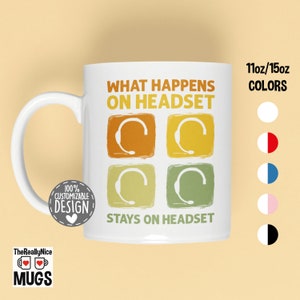 May include: White ceramic mug with a retro-style design featuring a headset and the text "What Happens On Headset Stays On Headset". The mug is 11oz or 15oz and is available in various colors.