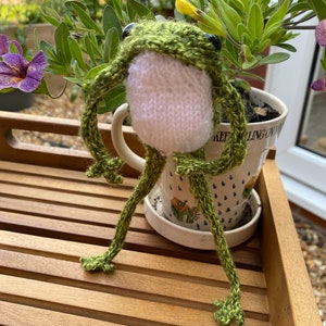 Speckled green hand knitted frog with with white tummy image 1