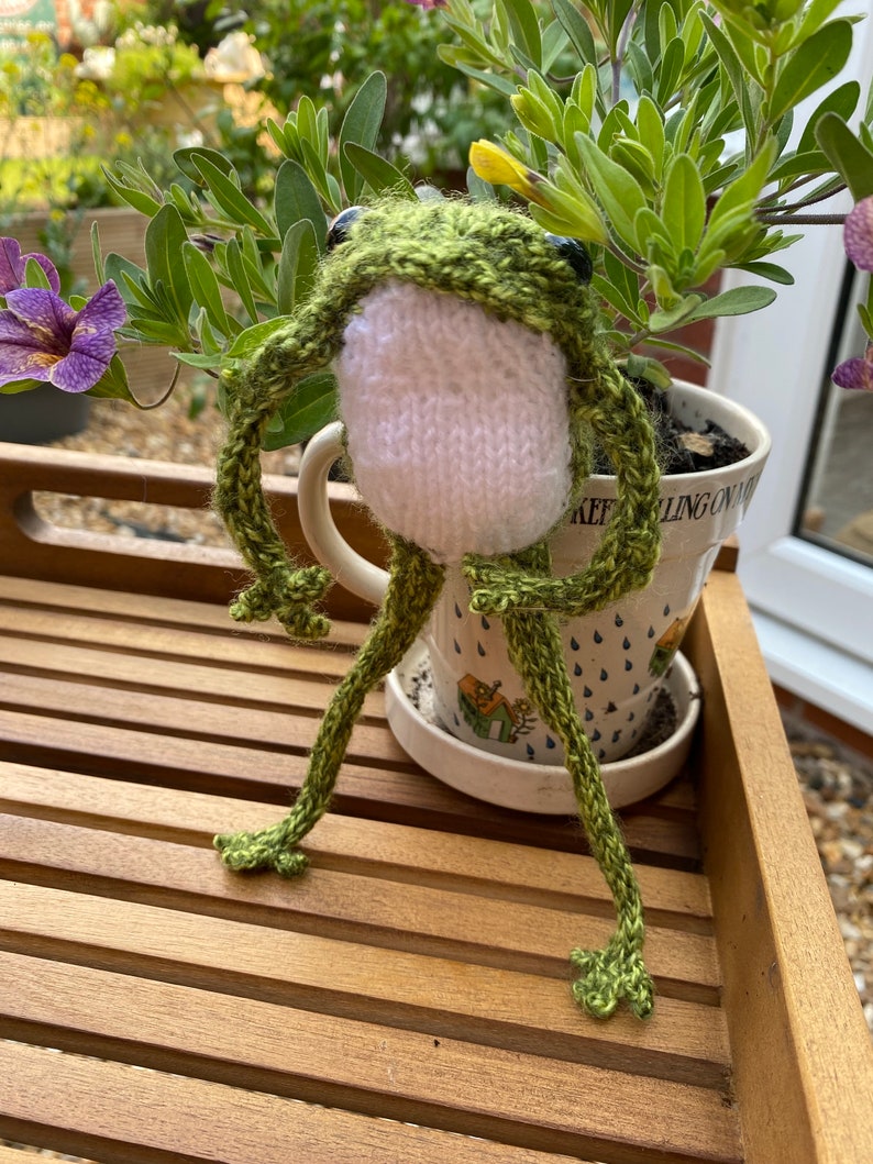 Speckled green hand knitted frog with with white tummy image 1