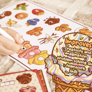 May include: A child's hand drawing on a white paper with colorful illustrations of ice cream and toppings. The paper includes the text "Improves: creativity and imagination, problem-solving skills, teamwork skills."