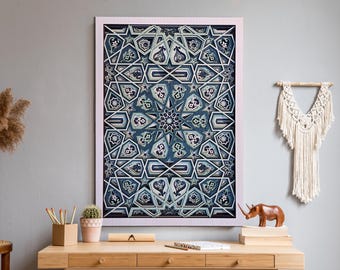 May include: A framed wall art piece with a geometric pattern in shades of blue, teal, and white. The artwork features an intricate design with a central starburst motif. The frame is white, and the artwork is displayed on a gray wall.
