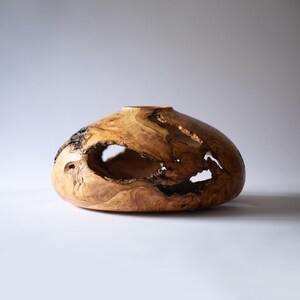 Turned wood vase, wide round form with narrow mouth, rustic art object.
