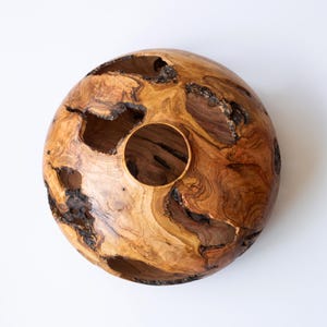 Coffee table wood vase, low rounded profile with dramatic bark inclusions.v