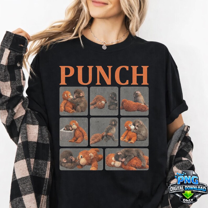 May include: Black t-shirt with the word "PUNCH" in orange block letters. The shirt features a grid of nine images of plush monkeys in various poses. The shirt is worn by a person with blonde hair.