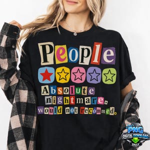 Puede incluir: Camiseta negra con la palabra "People" en letras recortadas de colores sobre cinco formas de estrella y la frase "Absolute nightmare, would not recommend." Un gráfico de descarga digital PNG está en la esquina inferior derecha.