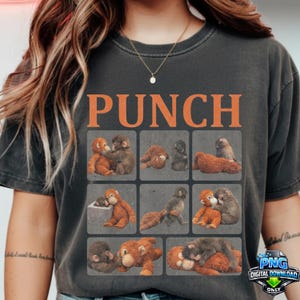 May include: Dark gray t-shirt with the word "PUNCH" in orange block letters. Below the text are nine squares, each containing a different illustration of a monkey. The shirt is a digital download.