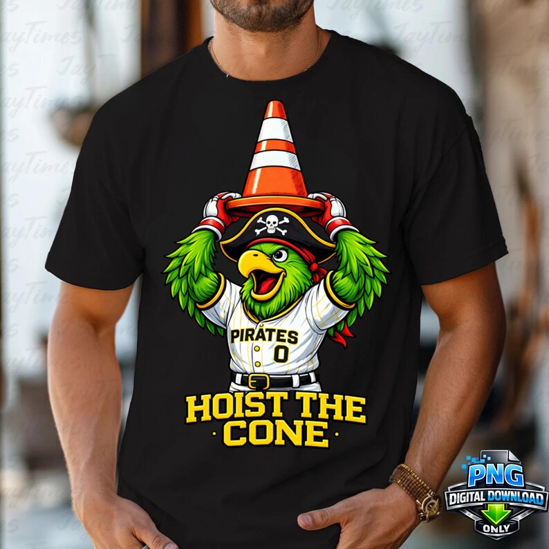 May include: Black t-shirt featuring a cartoon parrot wearing a pirate hat and holding an orange traffic cone. The parrot is wearing a baseball jersey that says "Pirates" and "0". The text "HOIST THE CONE" is below the parrot.