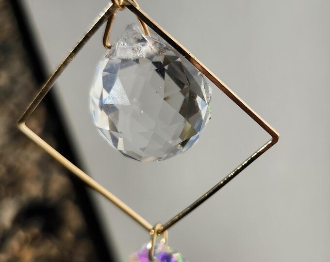 Suncatcher window charms display beautiful prisms