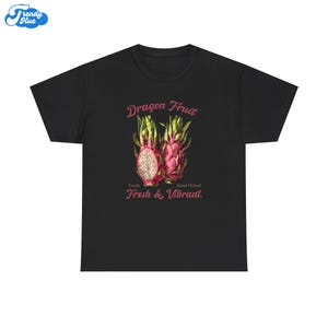 May include: Black t-shirt with a dragon fruit graphic. The design includes the words "Dragon Fruit", "Fresh & Vibrant", and an illustration of the fruit in pink, green, and white.