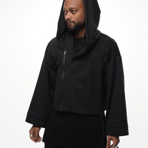 Short black avant-garde unisex kimono with hood, cropped black sweatshirt jacket with metal zipper, dark minimalist alternative clothing