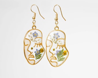 Abstract face gold earrings