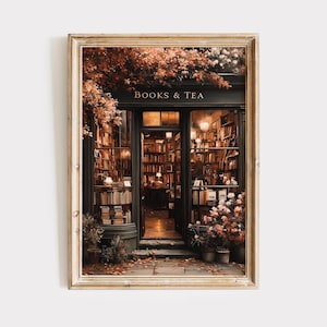 Puede incluir: Una impresión enmarcada de una librería con el texto "BOOKS & TEA" sobre la entrada. La tienda está llena de estanterías y una iluminación cálida. Hojas de otoño y flores enmarcan la entrada, creando un ambiente acogedor.