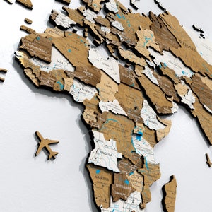 Art mural carte du monde - oeuvre d'art murale unique pour les amateurs de voyage, carte de voyage en bois, décoration murale d'appartement, carte en bois avec punaises, carte en bois 3D