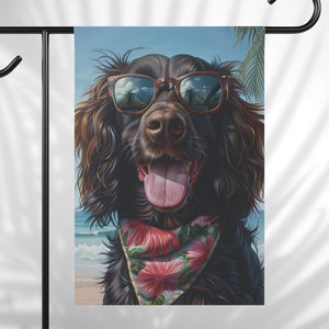 May include: A brown and black dog wearing sunglasses and a floral bandana. The dog is looking at the camera with its tongue sticking out. The background is a beach scene with palm trees and blue water.