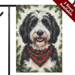 May include: A rectangular garden flag featuring a black and white dog with a fluffy coat wearing a red and green plaid bandana. The dog is centered against a cream background framed by green pine branches, pinecones, and red holly berries.