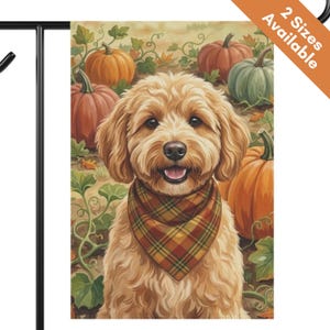 May include: A rectangular garden flag featuring a golden-brown doodle dog wearing a plaid bandana. The dog is centered against a background of orange and green pumpkins with green vines and leaves. The top corner includes text stating 2 Sizes Available.