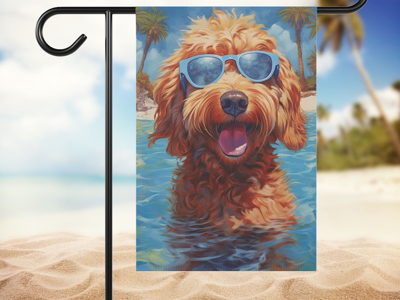 May include: A brown and white dog wearing blue sunglasses is in the water. The dog is smiling and has its tongue sticking out. The dog is in front of a blue ocean and a beach with palm trees.
