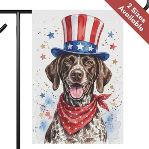 May include: A garden flag featuring a watercolor illustration of a dog wearing a patriotic top hat and bandana. The hat is red, white, and blue, and the bandana has white stars. The flag has the text "2 Sizes Available" in the upper right corner.