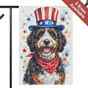 May include: A garden flag featuring a Bernedoodle dog wearing a patriotic top hat and bandana. The dog has black, brown, and white fur, with a red and white bandana and a blue, red, and white hat. The background has watercolor stars.