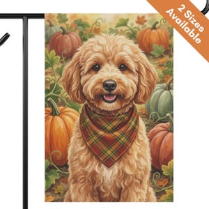 May include: A rectangular garden flag featuring a fluffy golden-brown dog wearing a red, green, and yellow plaid bandana. The dog is centered against a background of orange and green pumpkins with green vines and autumn leaves. Text reads 2 Sizes Available.