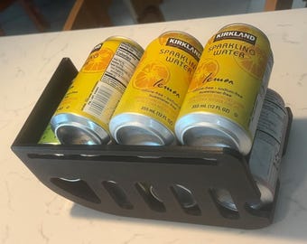Soporte FIFO para latas de refresco
