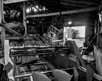 Abandoned Barn with Antique Manure Spreader and Hayloft