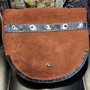 Bolsa de transporte oculta estilo alforja doble
