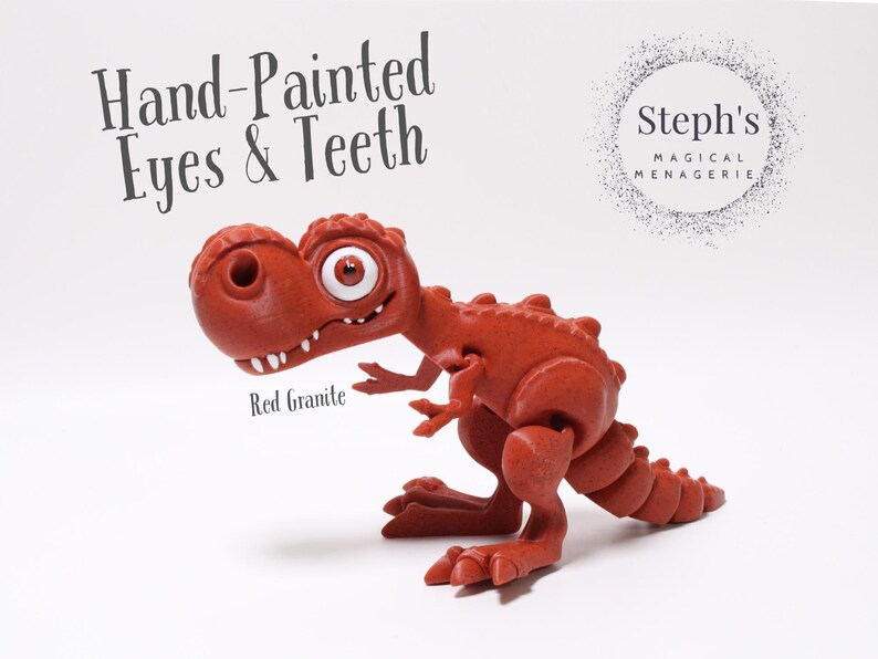 May include: Hand-painted red dinosaur toy with a toothy grin and large eyes. The toy is made of a textured material and is labelled "Red Granite". The image also includes the text "Steph's Magical Menagerie".
