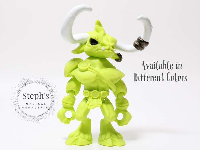 May include: A lime green figurine of a horned creature with white horns and dark accents. The figure has a muscular build and is posed upright. Text on the image says "Available in Different Colors."