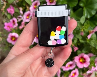 Prescription bottle shaker badge reel, Black w/multi colors